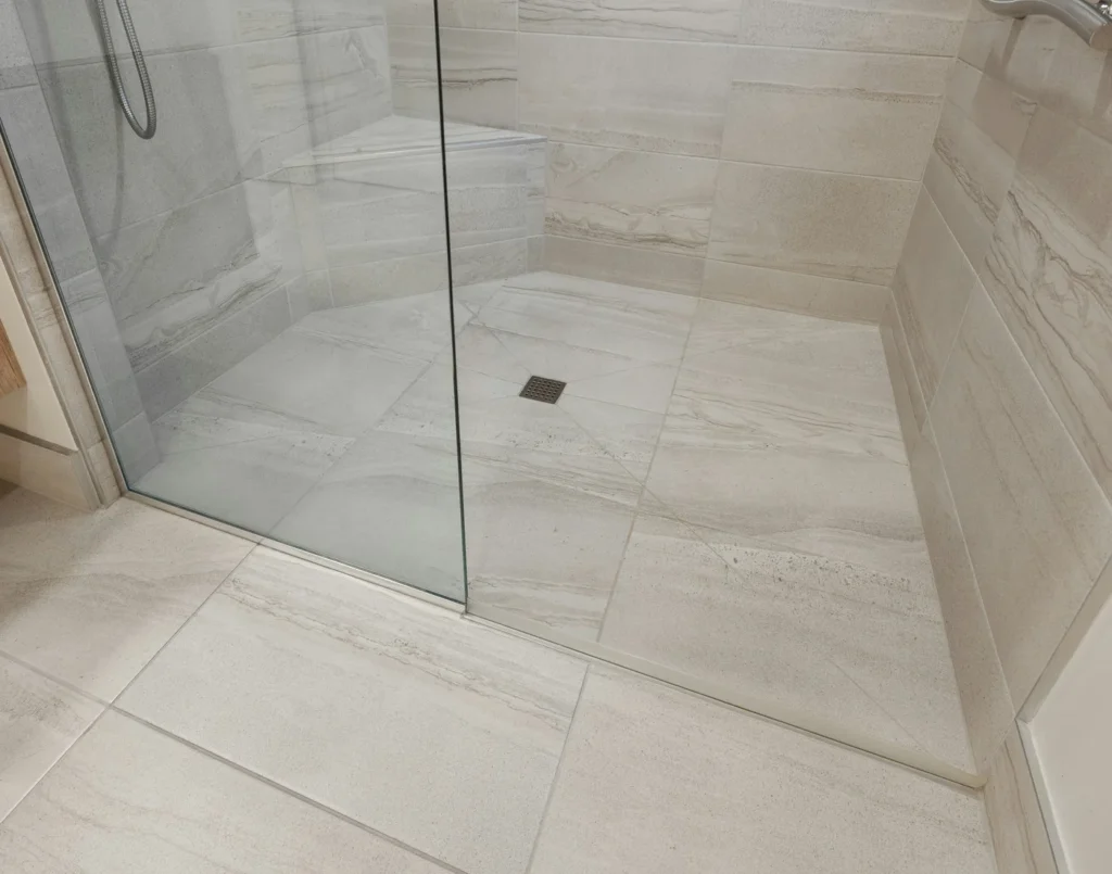 Walk-in shower — finished floor and walls